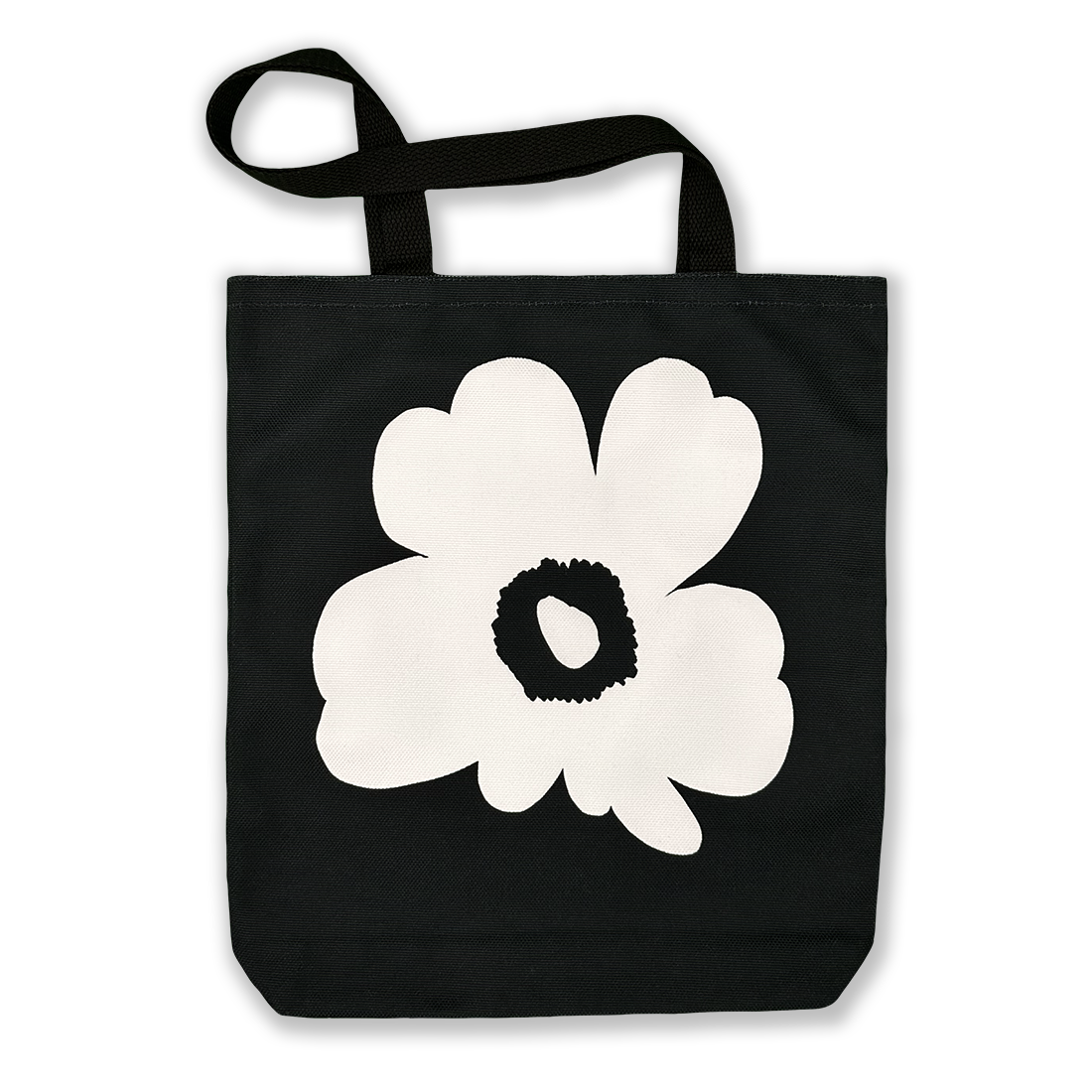 Full view of a black tote bag with a striking white floral print, perfect for stylish and functional carrying.